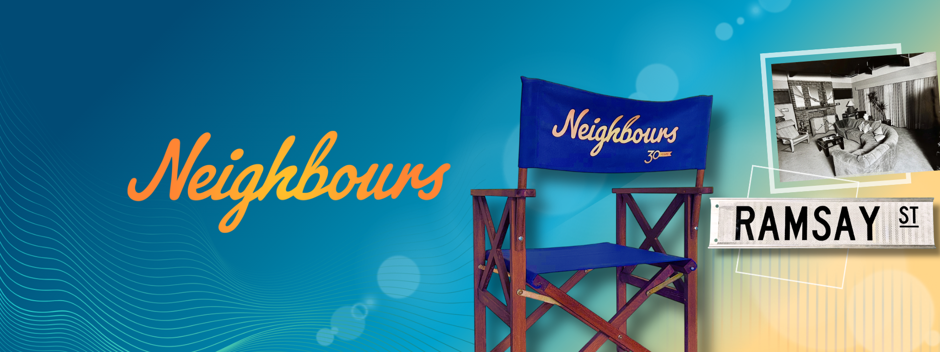 Chair with 'Neighbours' banner and Ramsay Street sign on a blue background