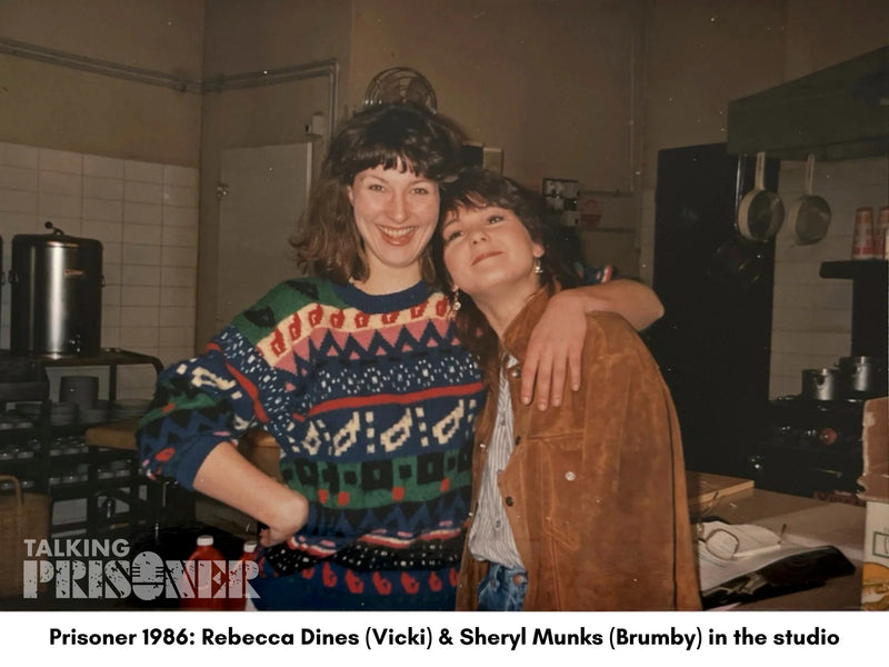 Two women posing together in a studio setting with 'Talking Prisoner' branding.